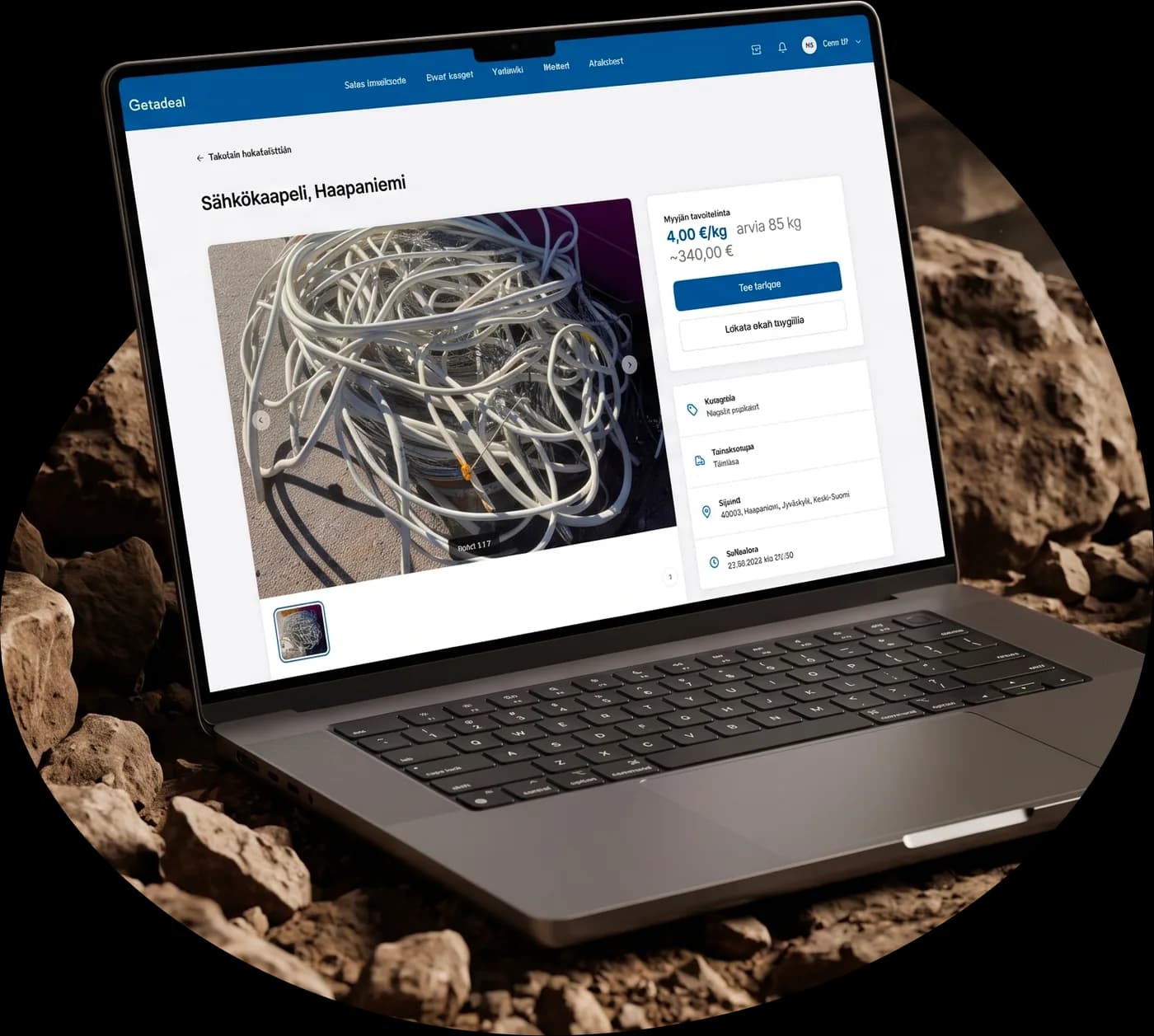 The Getadeal buyer portal on a laptop, scrap metal in the background